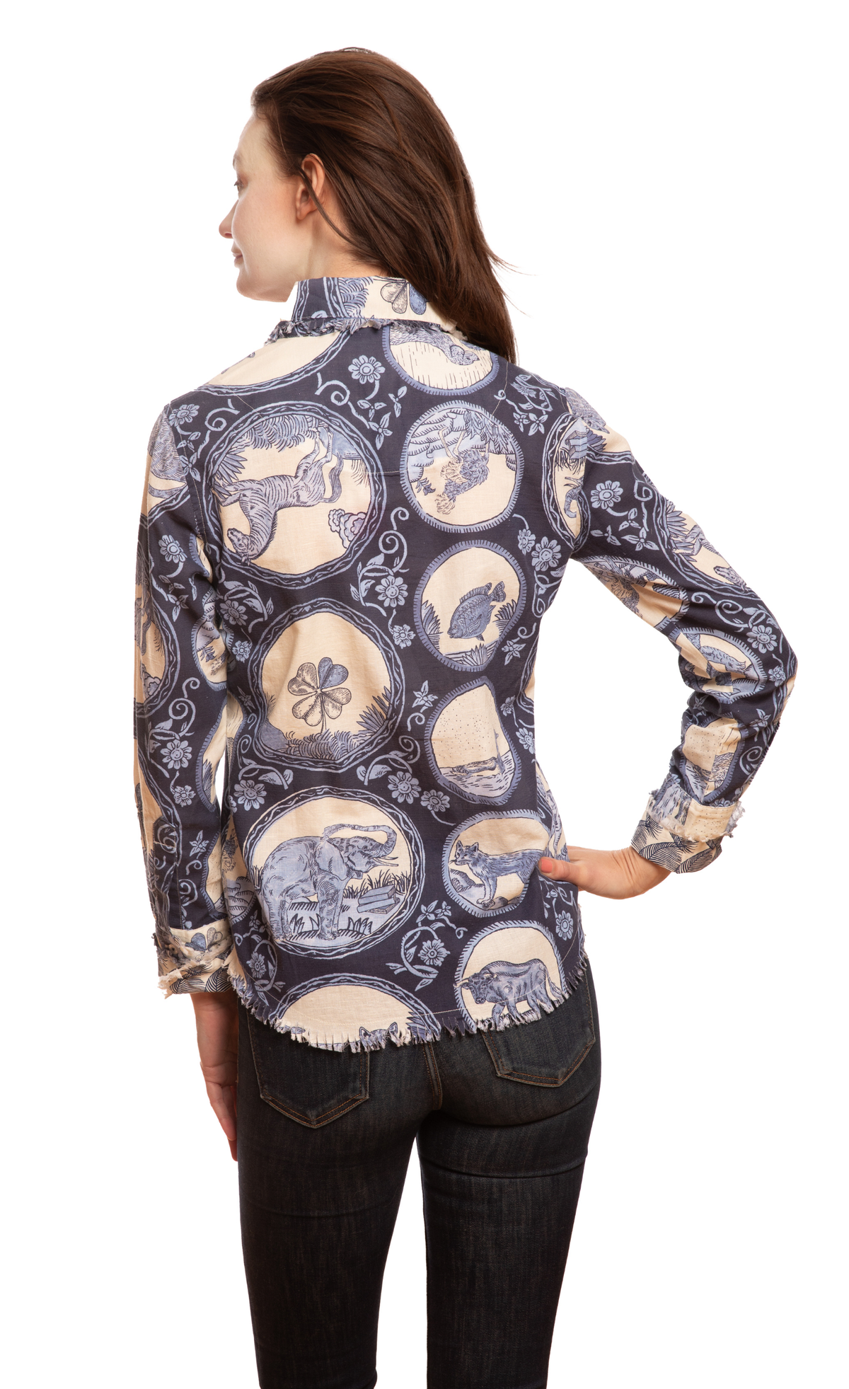 Back view of blue medallion print tunic top with long sleeves