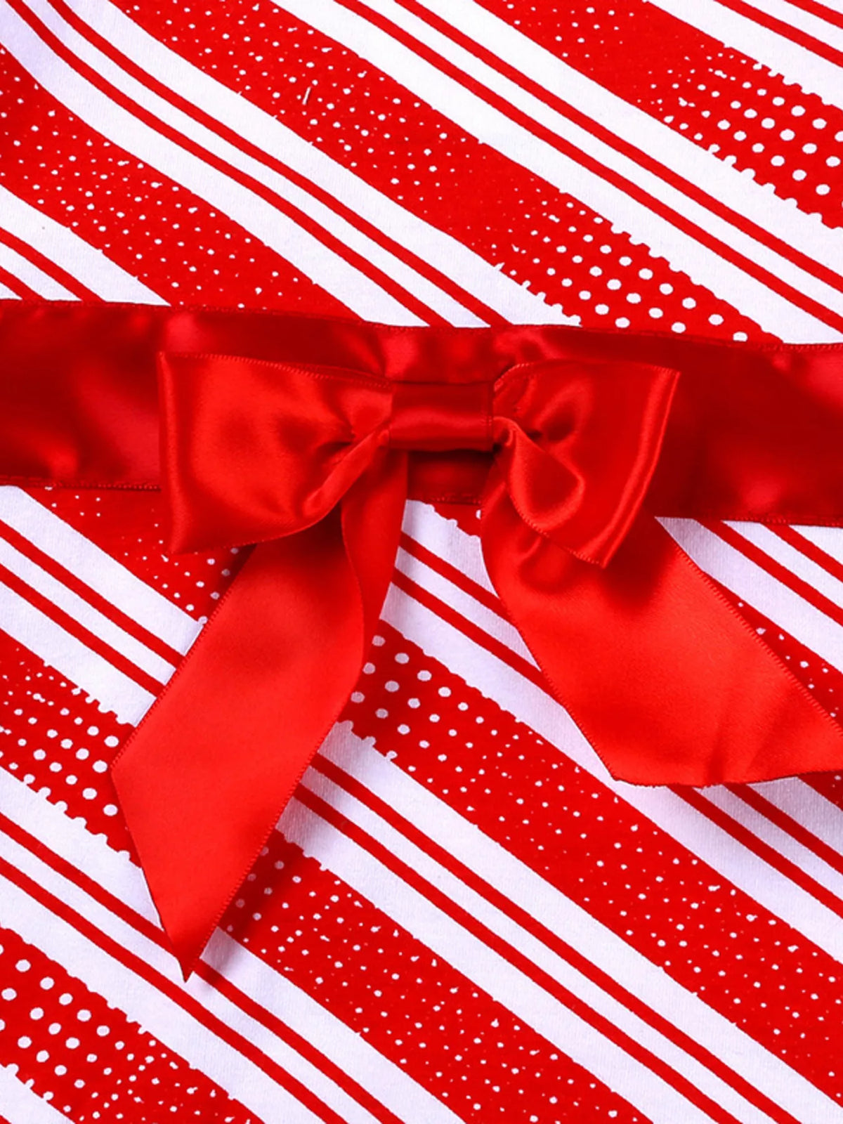 Red satin bow detail on a red-and-white striped long-sleeve top