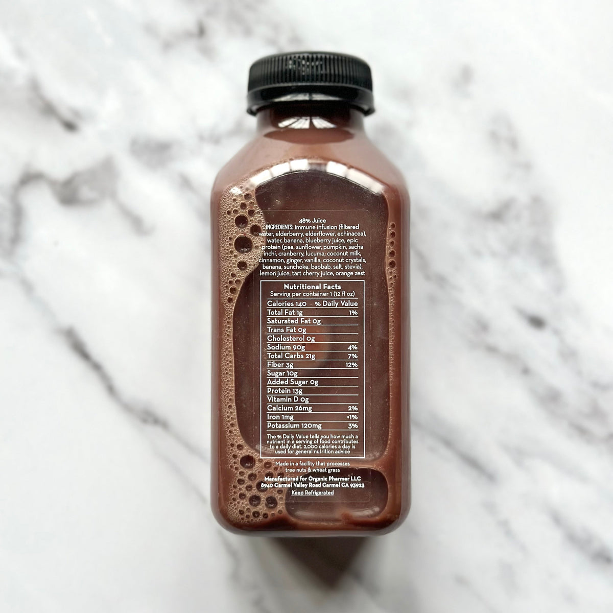 Organic Pharmer Defense+ protein shake bottle, nutrition facts panel on back