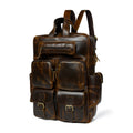 Brown leather multi-pocket backpack with front flap pockets and top carry handle
