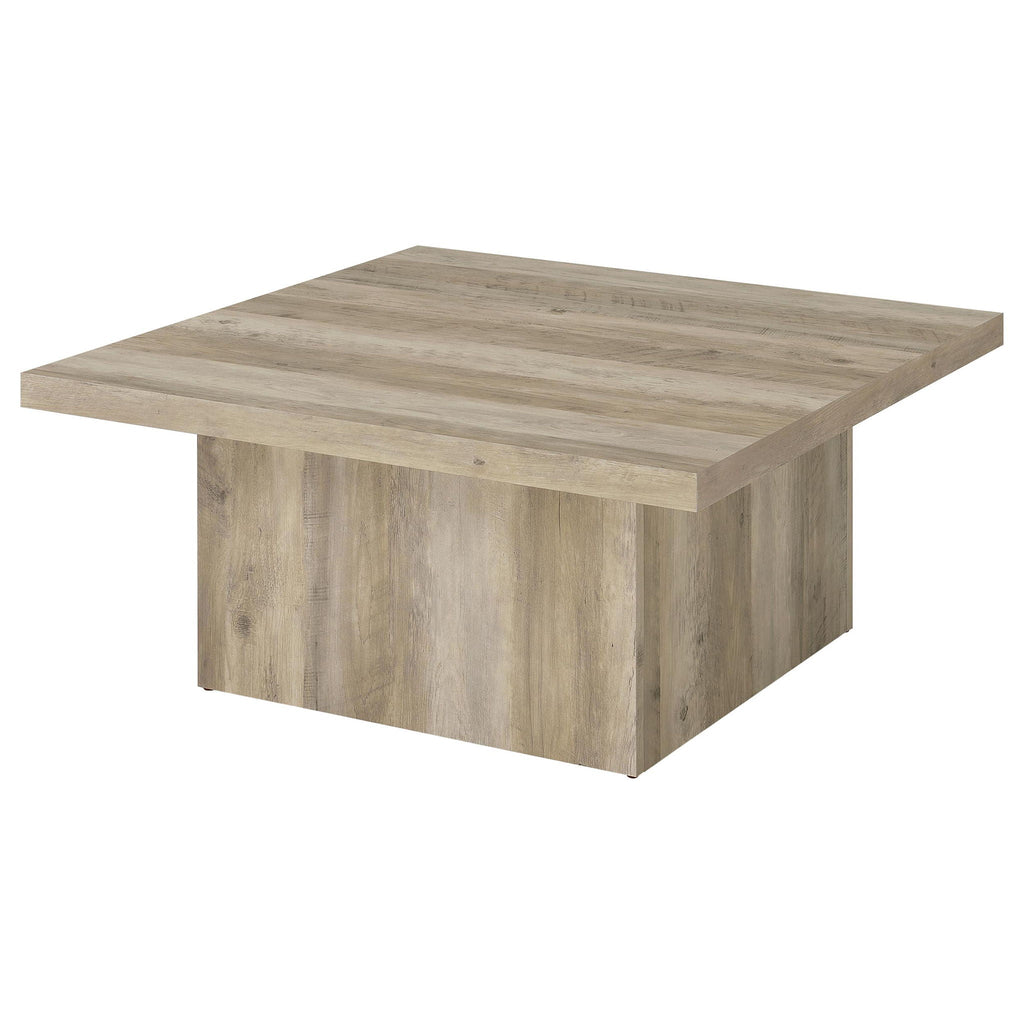 Distressed pine square coffee table with sturdy base and flat tabletop