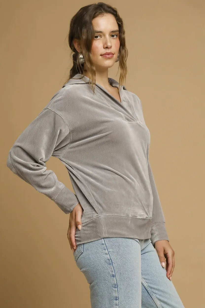 Grey long-sleeve collared top with dropped shoulders and ribbed hem