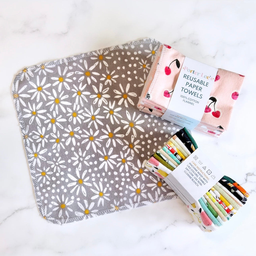 Reusable paper towels on gray daisy fabric: roll with cherry print plus colorful markers