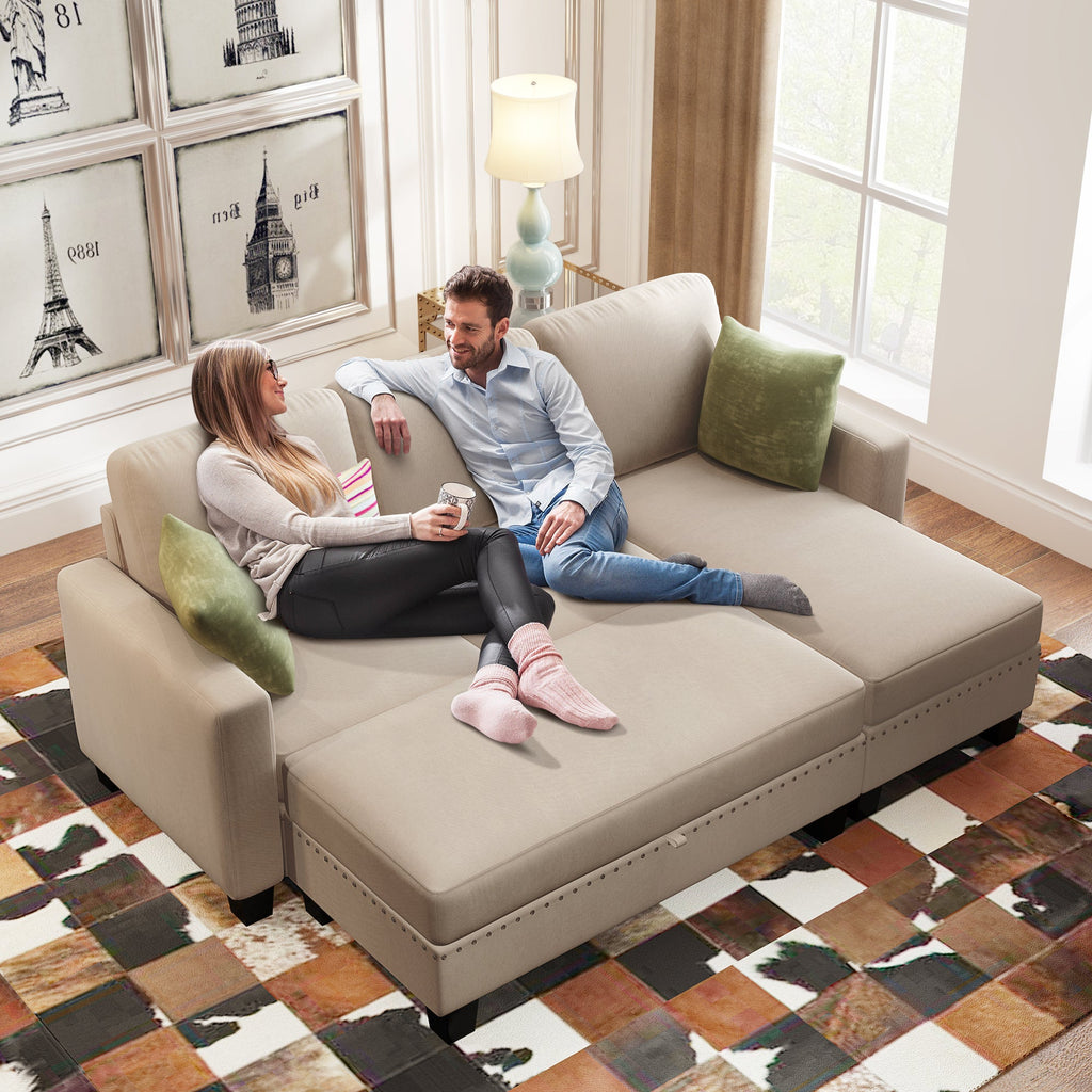 Warm grey sectional sofa with chaise, seat cushions, and decorative pillows in living room