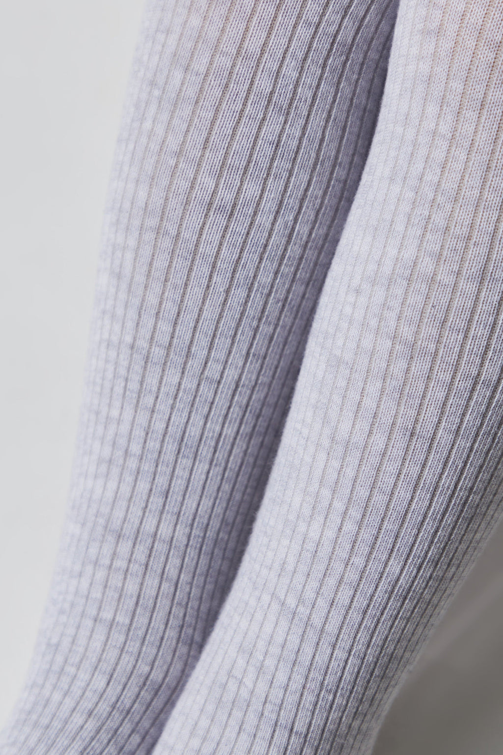 Children's cotton tights detail, light gray ribbed knit with vertical texture lines