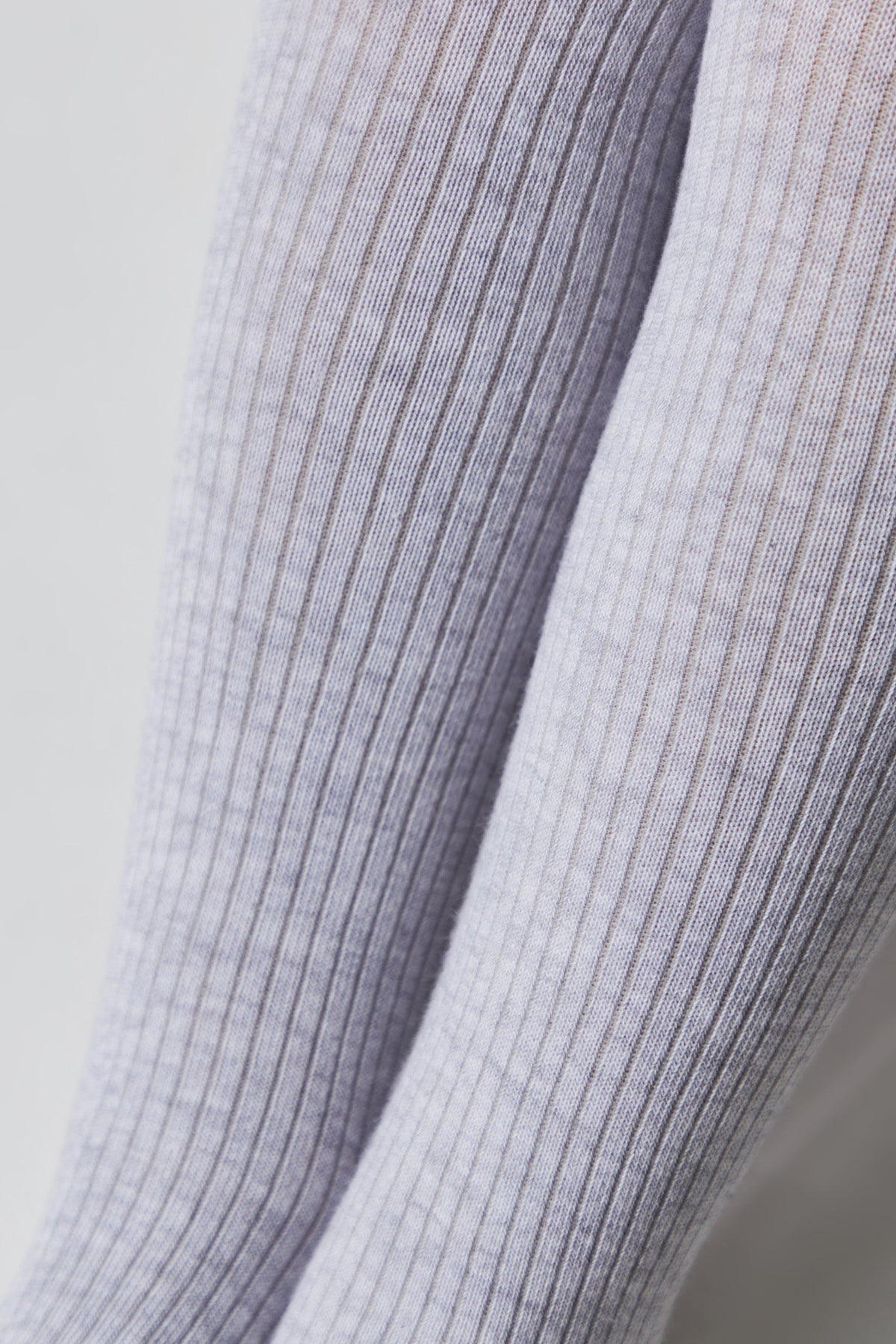 Children's cotton tights detail, light gray ribbed knit with vertical texture lines