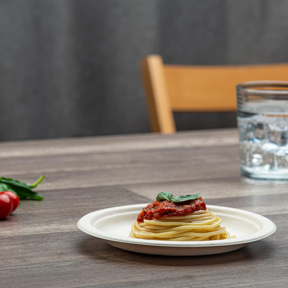 Unbleached paper plate holding spaghetti with meat sauce, 7-inch size