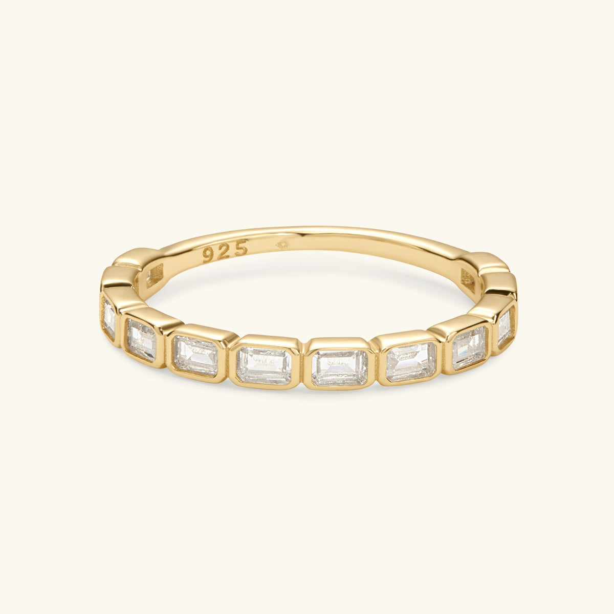 Gold-tone eternity band ring with rectangular clear stones, 925 stamped inside
