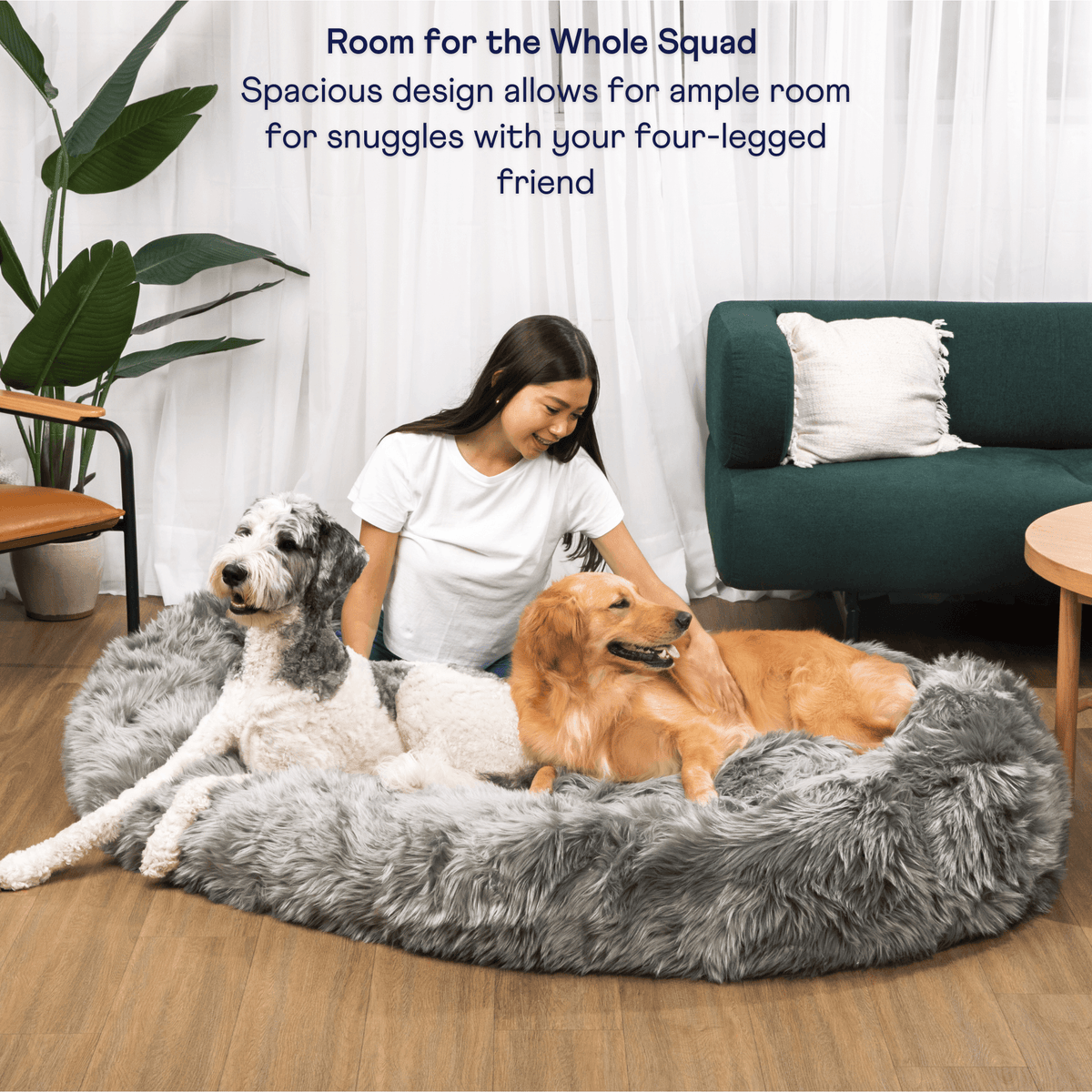 Charcoal grey faux fur memory foam dog bed, spacious oval shape with pets resting