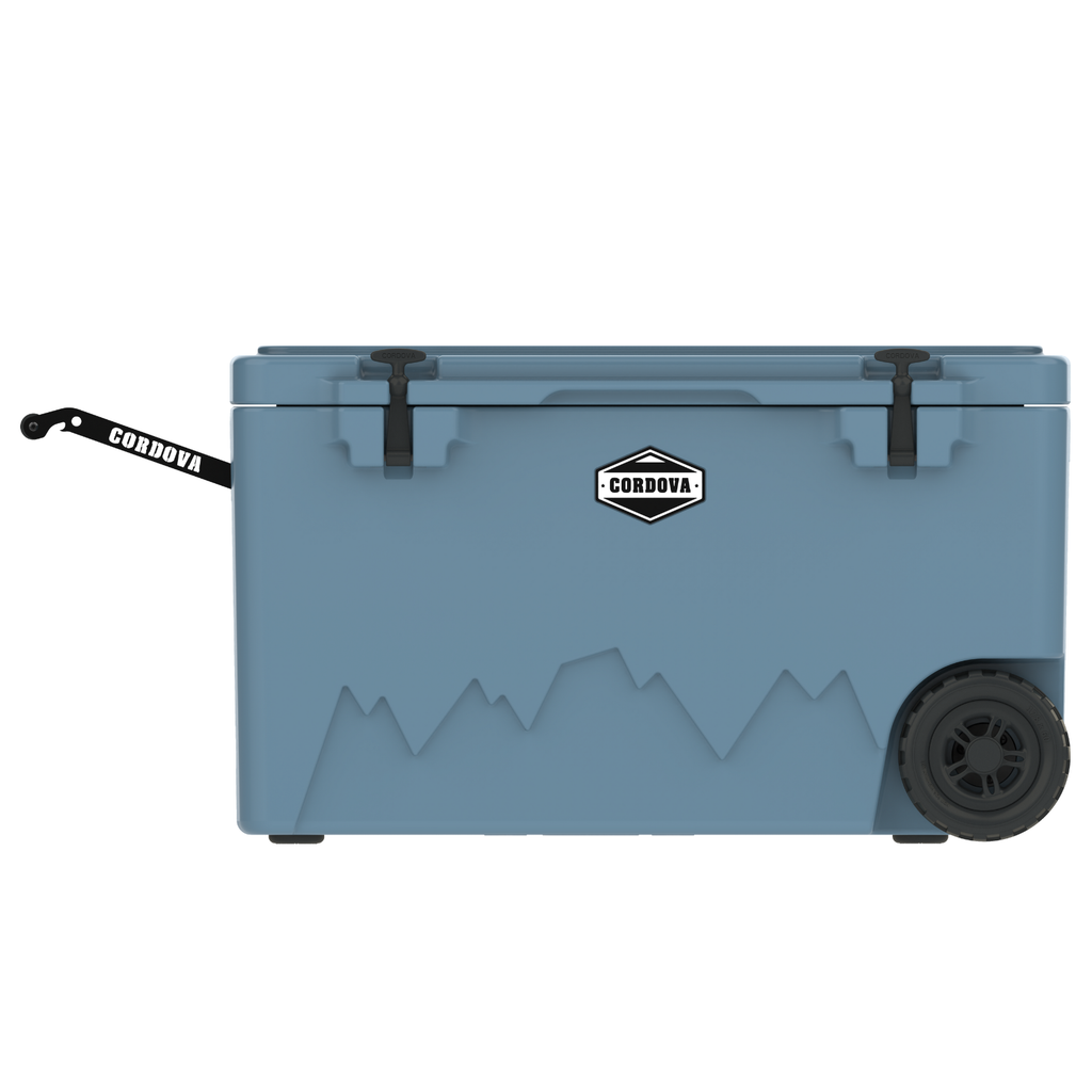 Light blue 125 qt wheeled cooler with Cordova badge, side strap, and rear wheel