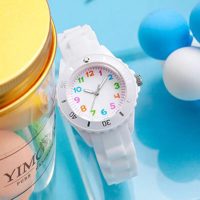 White kids analog wristwatch with silicone strap and colorful dial, waterproof quartz