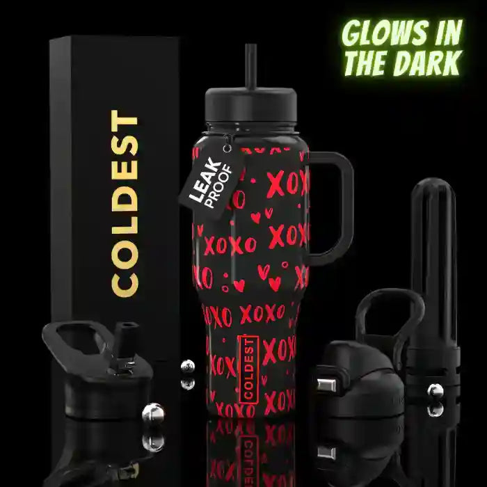 COLDEST 36oz insulated tumbler with leak-proof lid, black and red XOXO pattern, metal straw.