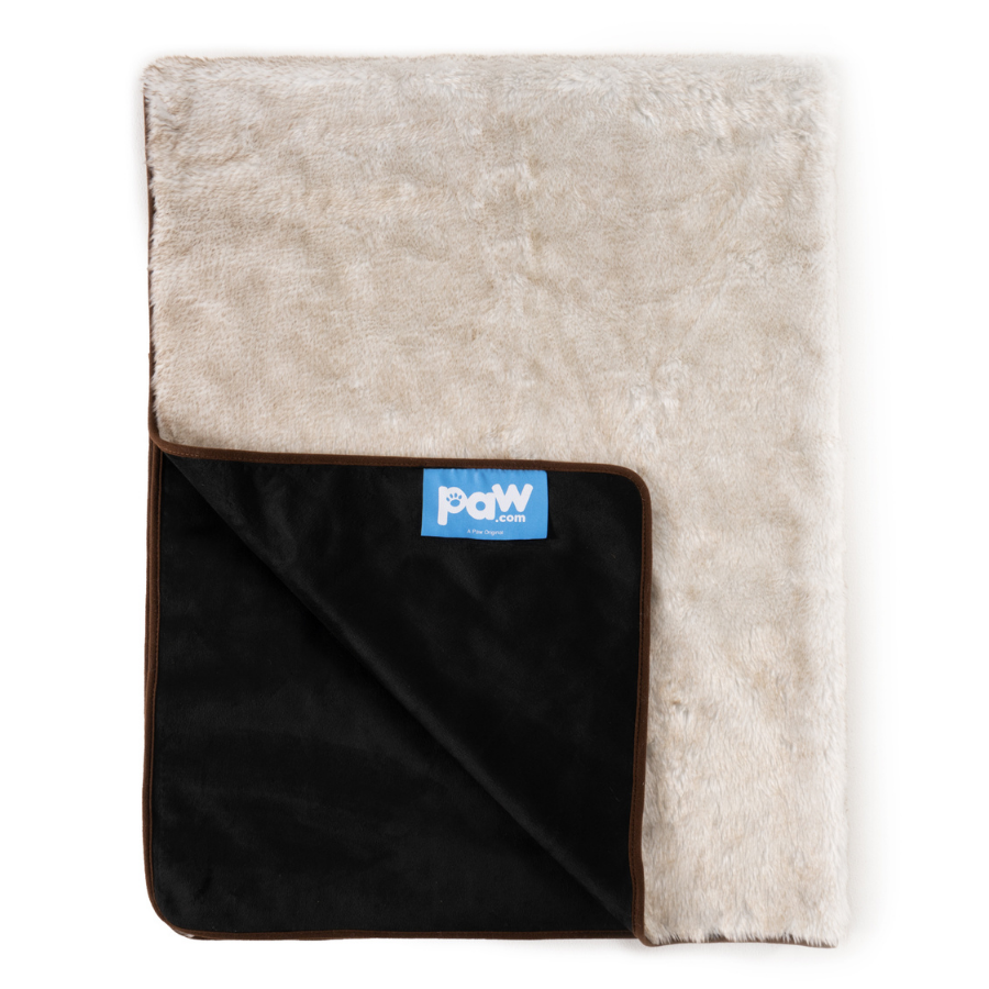 White faux-fur pet blanket with black backing and blue paw.com patch, brown trim