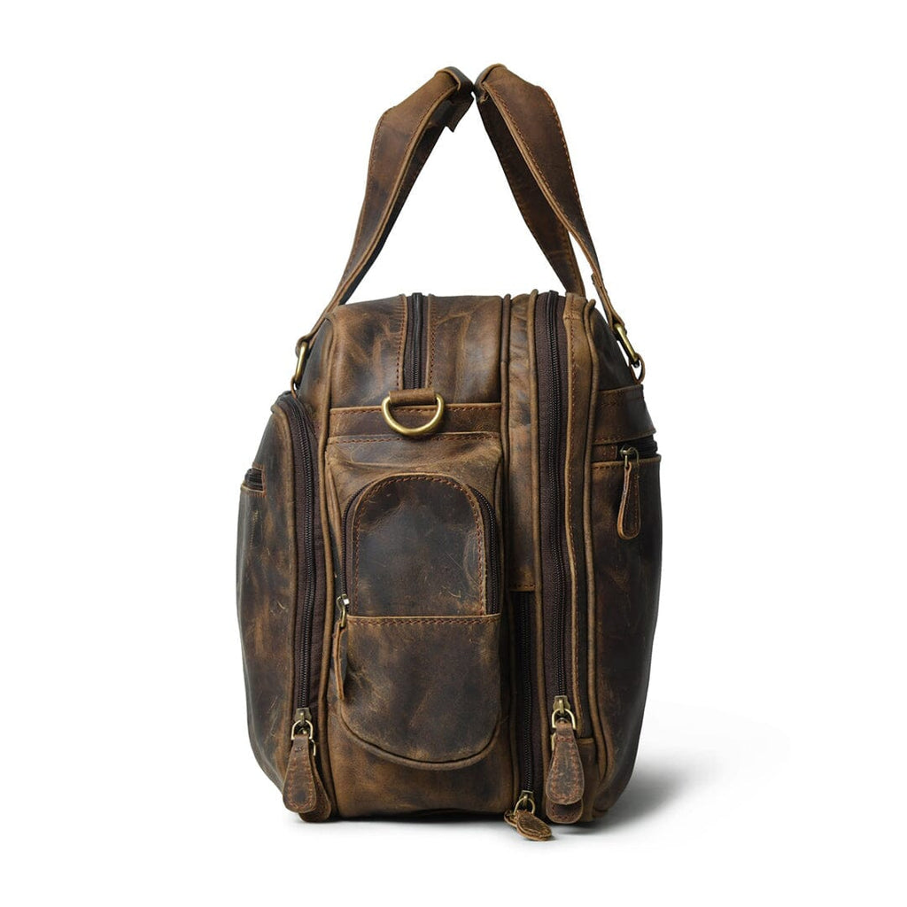 Brown leather briefcase with zip pockets, side buttons, and short top handles