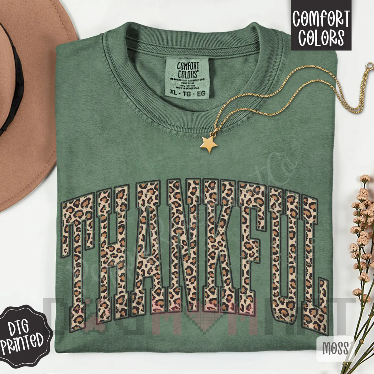 Women’s green T-shirt with leopard-print “Thankful” graphic and gold star pendant