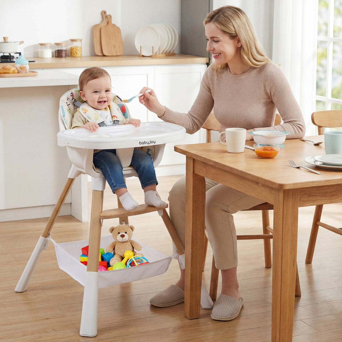 Multicolor baby high chair with tray, patterned seat, and hanging toy storage bin