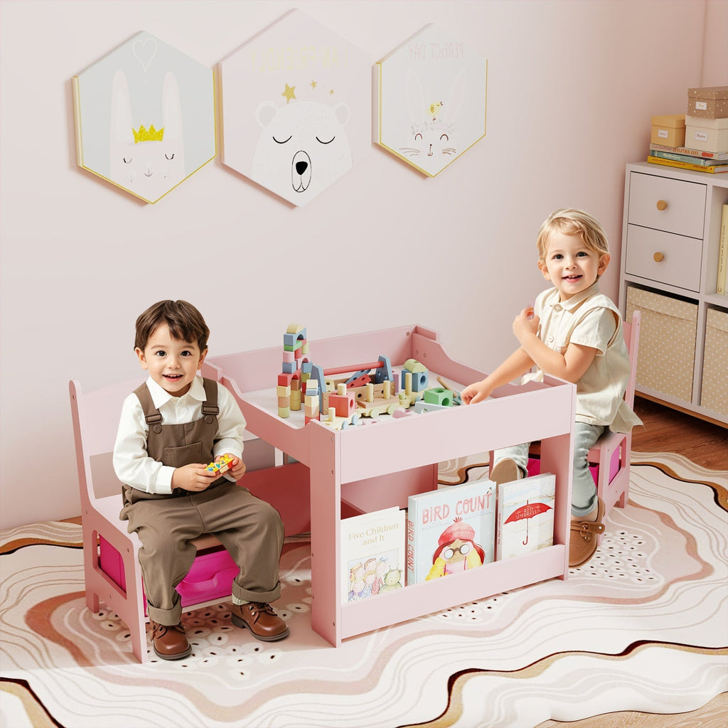 Pink kids activity table with two chairs, side cubbies for books and toys