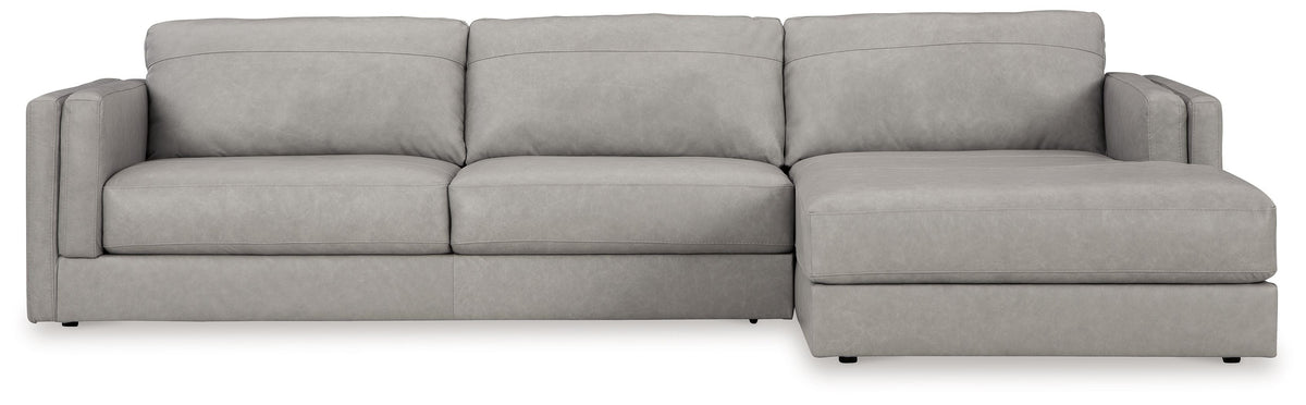 Light gray upholstered sectional sofa with chaise and three back cushions