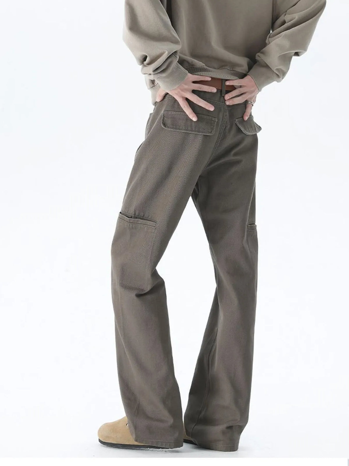 Brown wide-leg casual pants with side pockets and relaxed fit