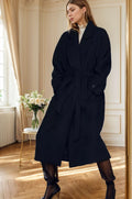 Women\'s black wool coat with sash tie waist and side pocket details, long sleeves