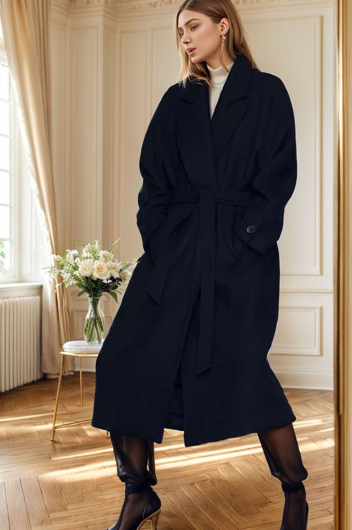 Women\'s black wool coat with sash tie waist and side pocket details, long sleeves