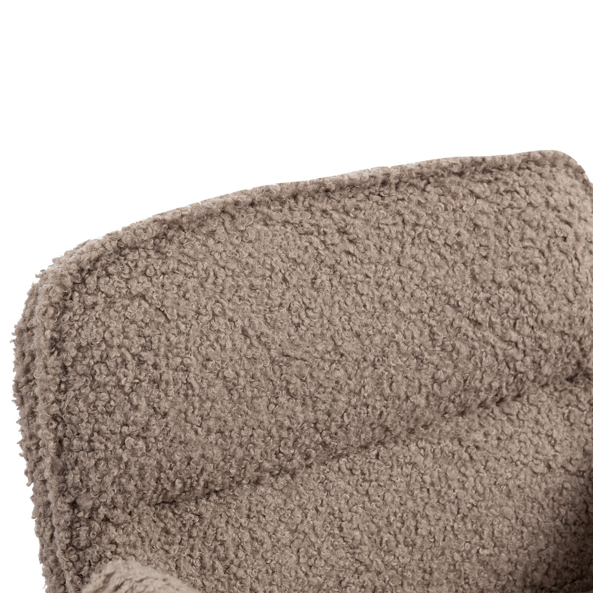 Close-up of textured dark-beige chair upholstery, rounded edge seam