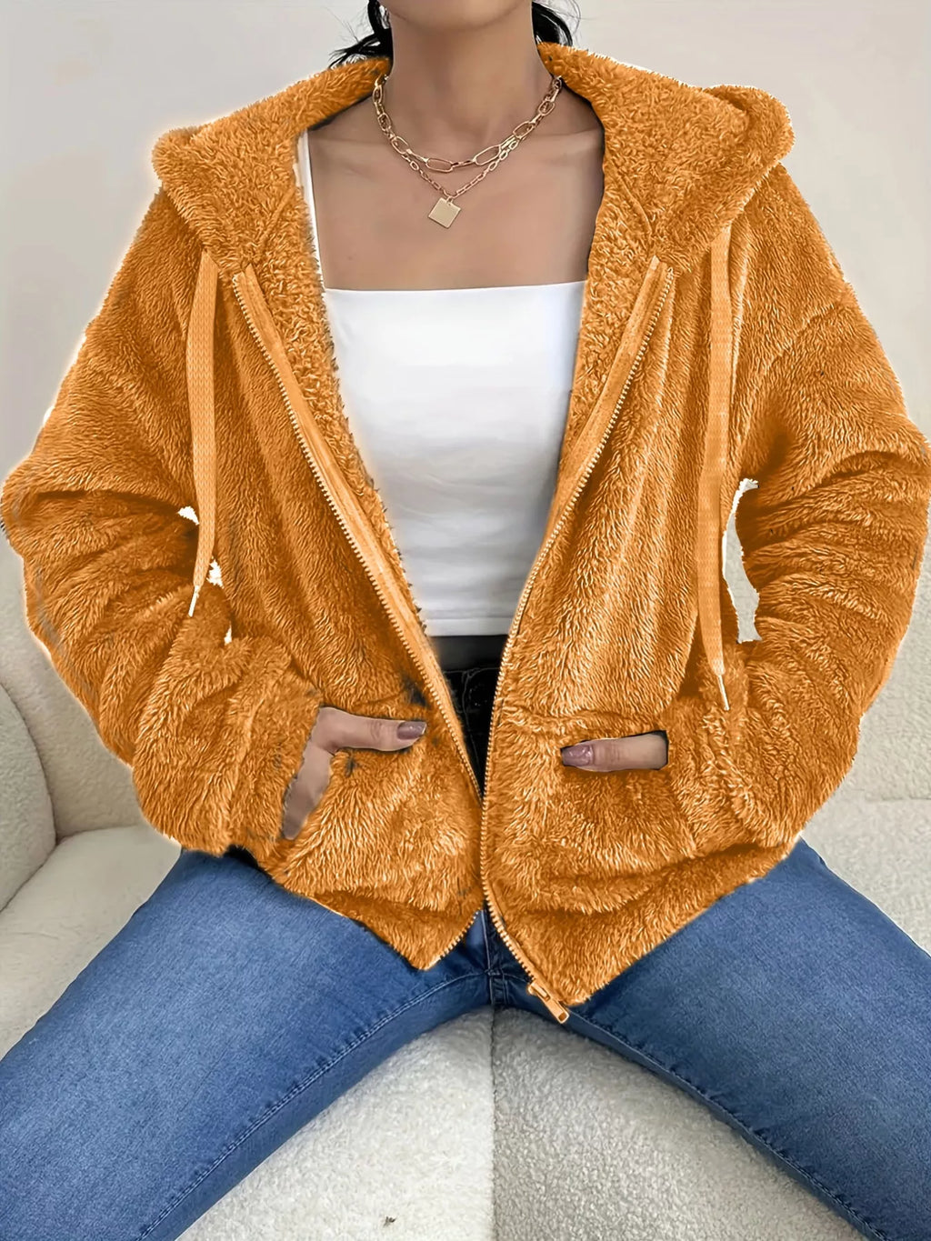 Mustard orange fleece zip-up jacket with full zipper and two front pockets