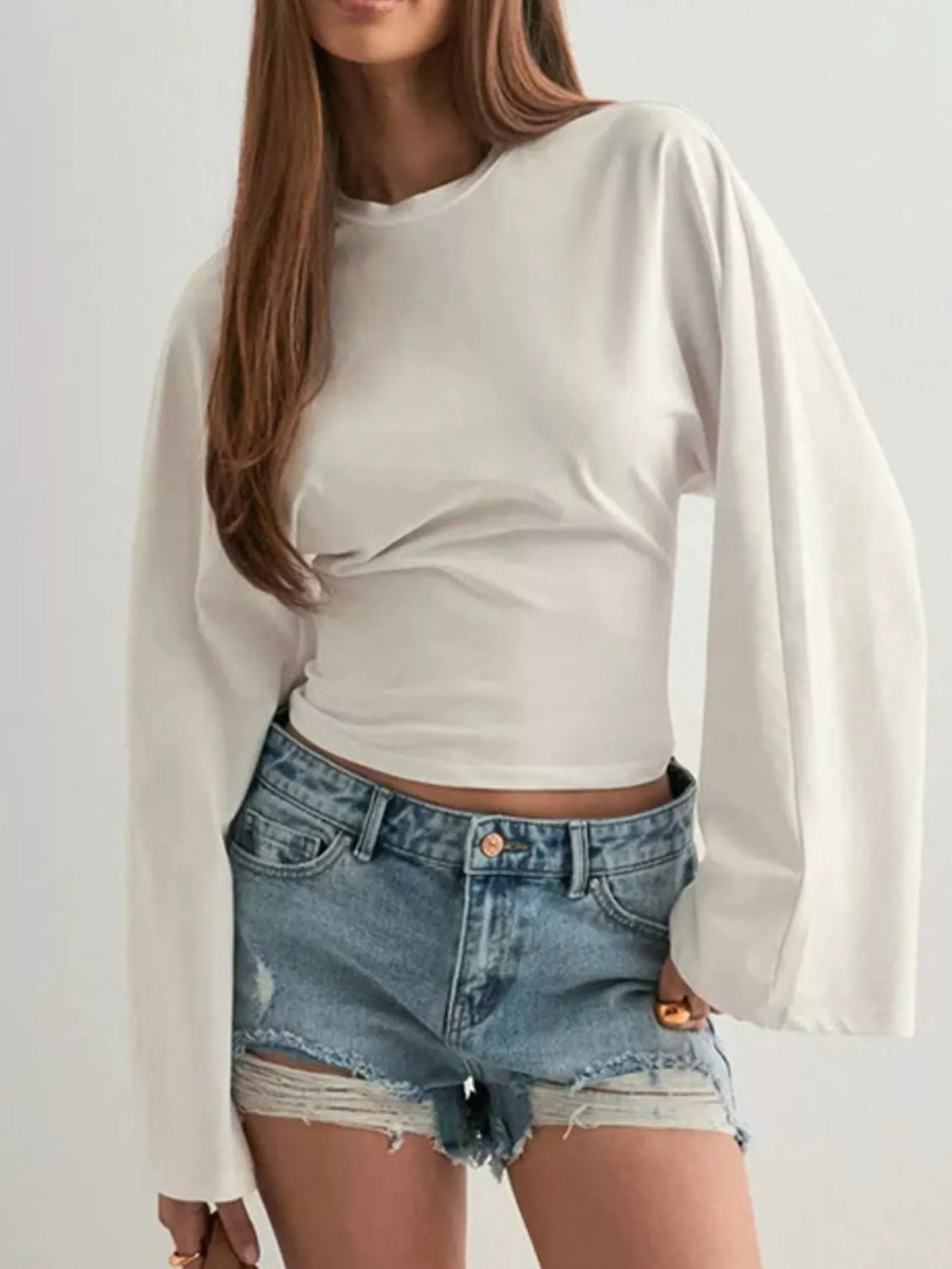 Plus size fitted long-sleeve T-shirt in cream with crew neck and long flared sleeves
