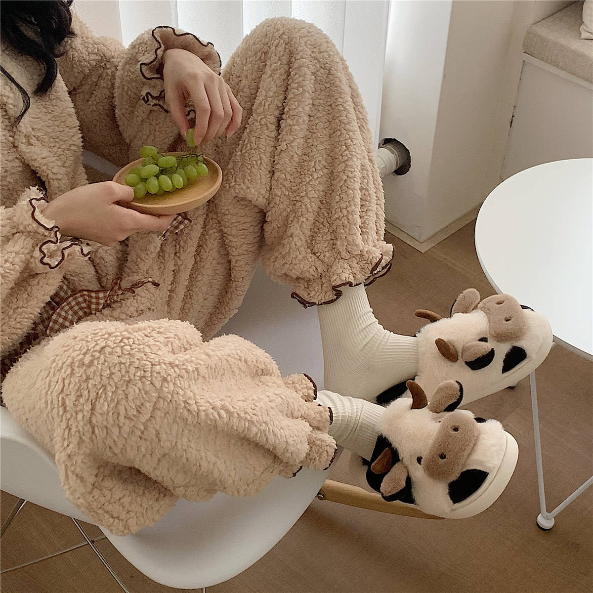 Fluffy cow cartoon house slippers with bear-like cuff and white soles, cute face design