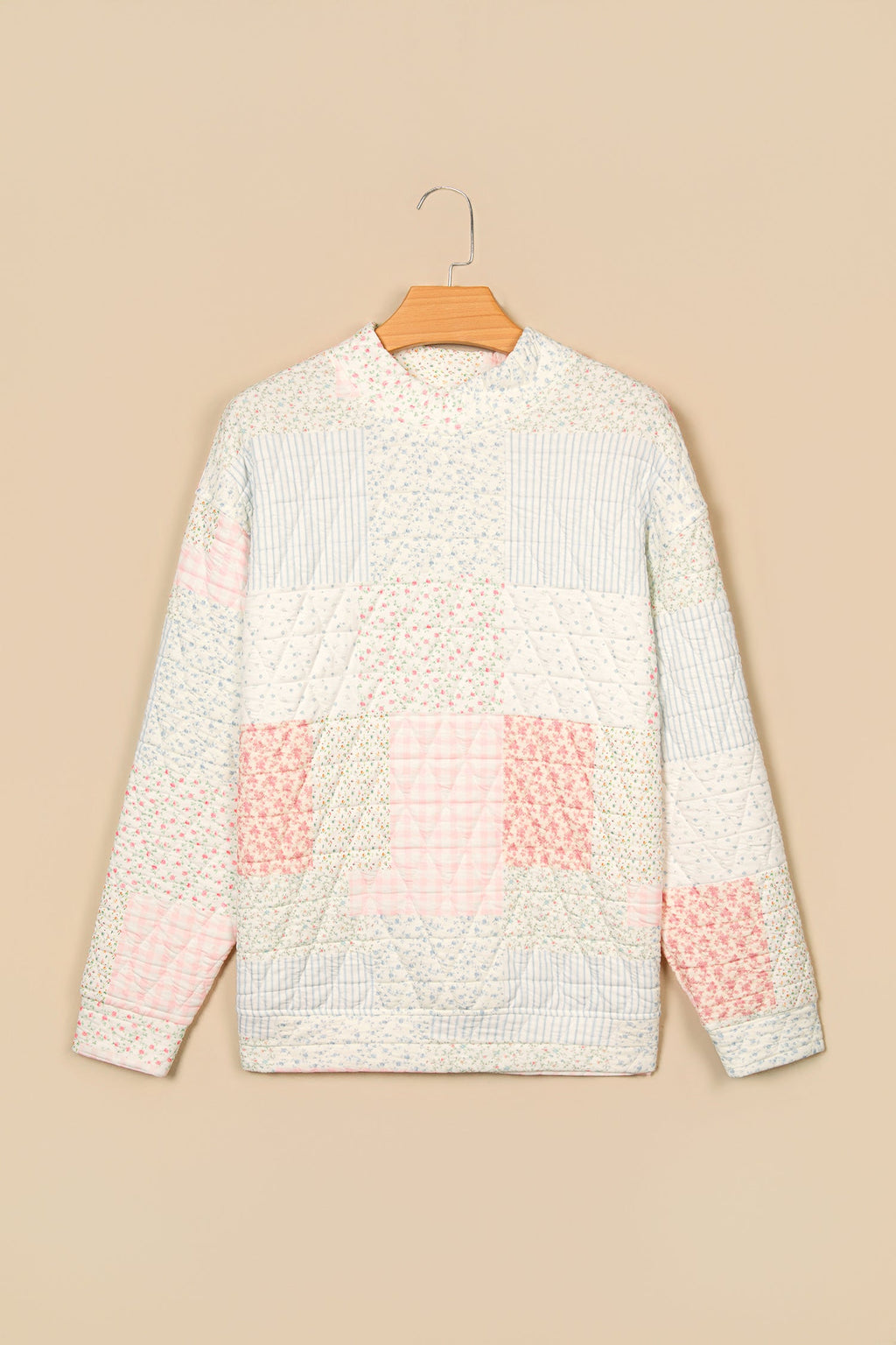 Floral patchwork quilted mock neck long sleeve top, multicolour, back on hanger
