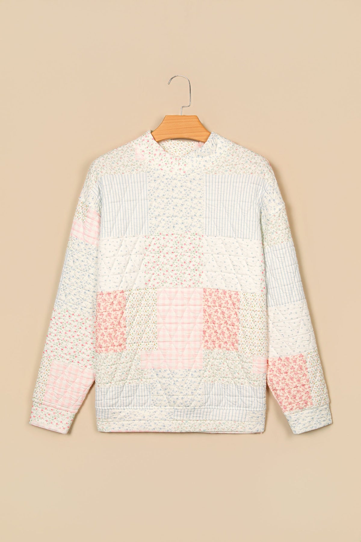 Floral patchwork quilted mock neck long sleeve top, multicolour, back on hanger