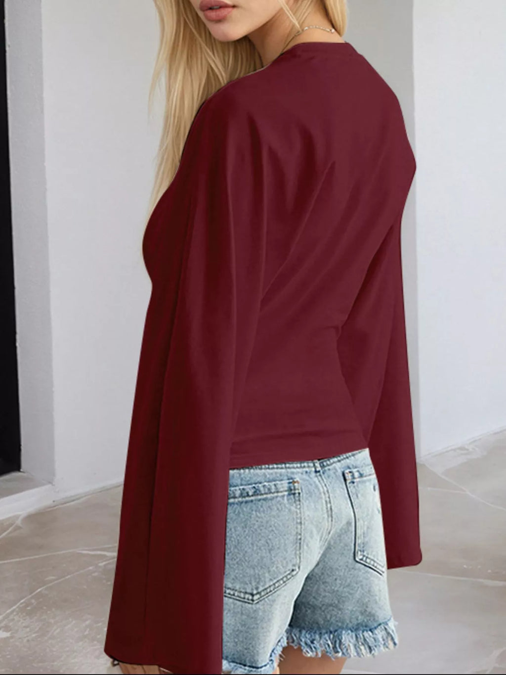Wine red fitted long-sleeve t-shirt with crew neck, plus-size side view