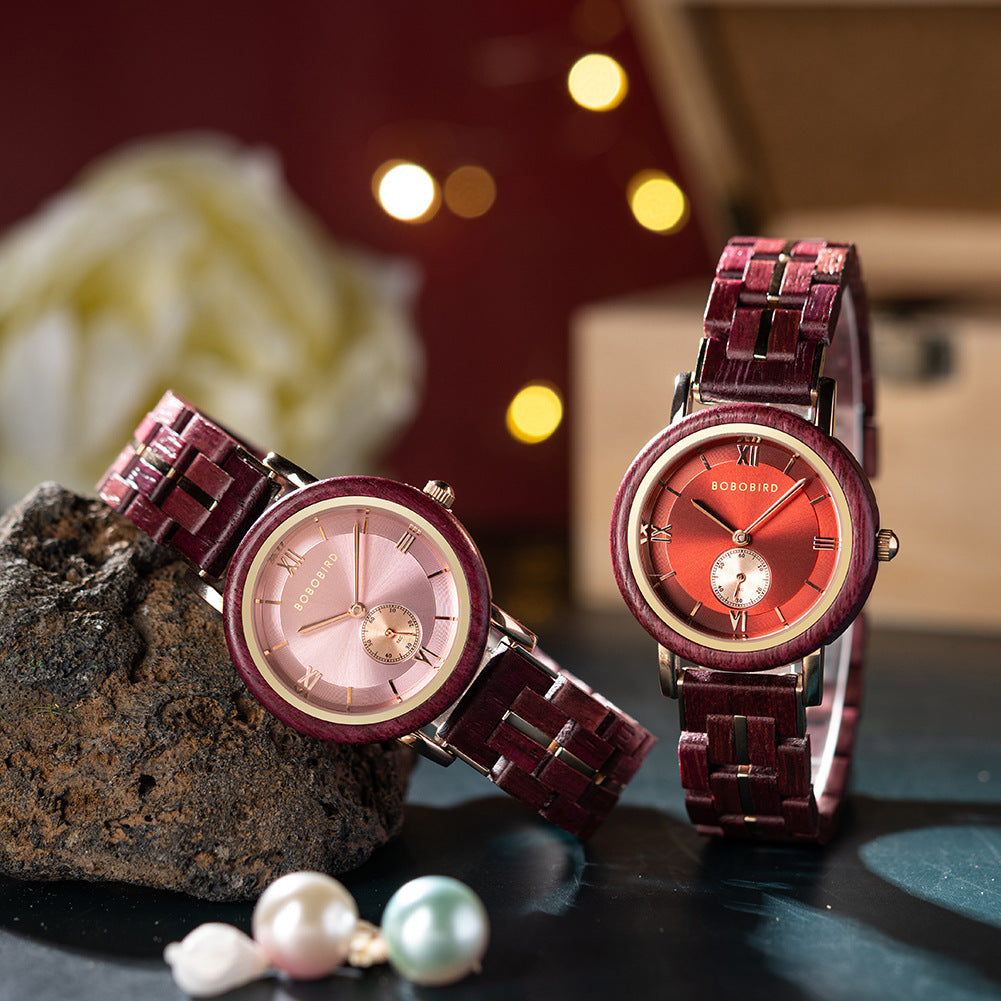 Dark maroon wooden quartz watch with red dial and gold-toned hands