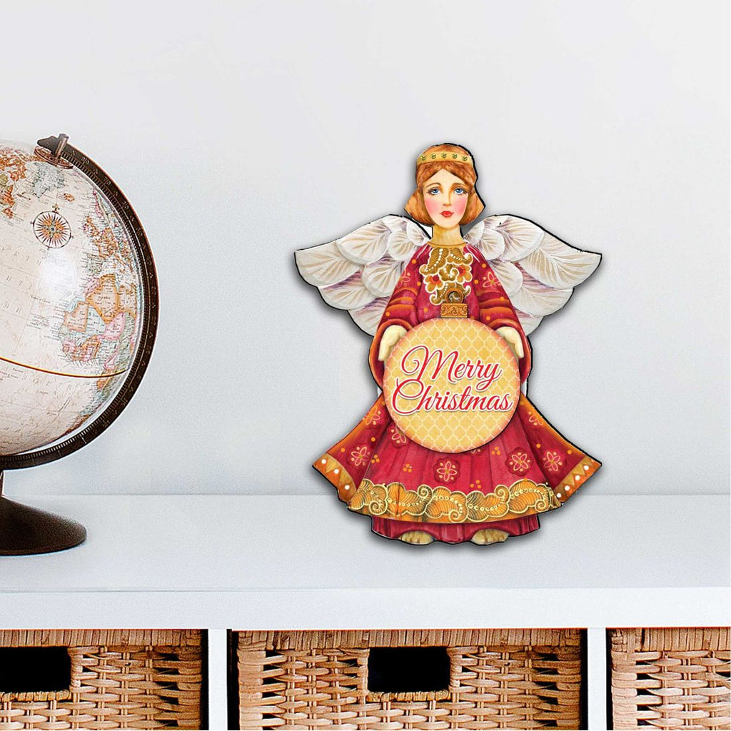 Nativity angel ornament with 'Merry Christmas' heart, red dress and white wings