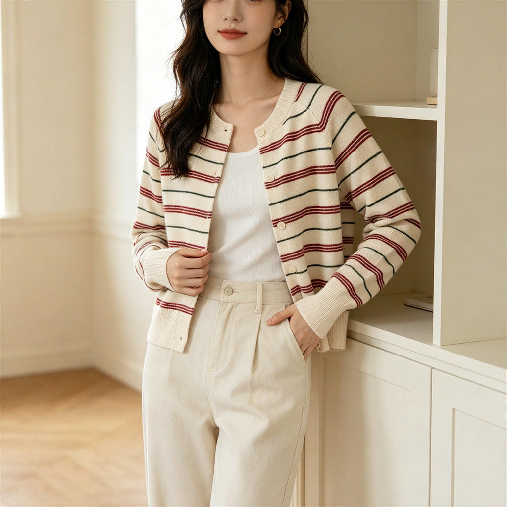 Cream striped cardigan with button front, long sleeves, contrasting red and dark stripe trim
