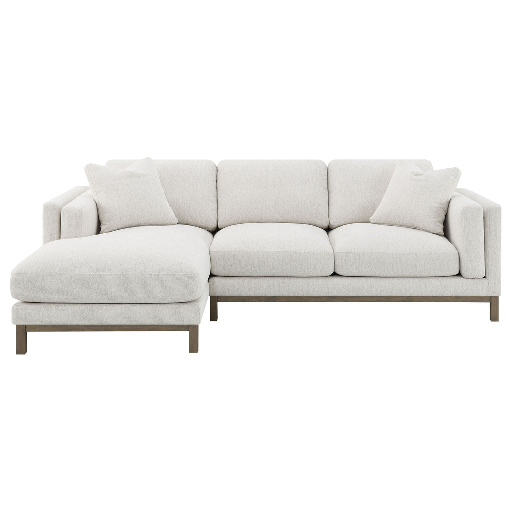 Sand boucle chaise corner sofa, multiple back pillows, slipcovered look, dark wood legs