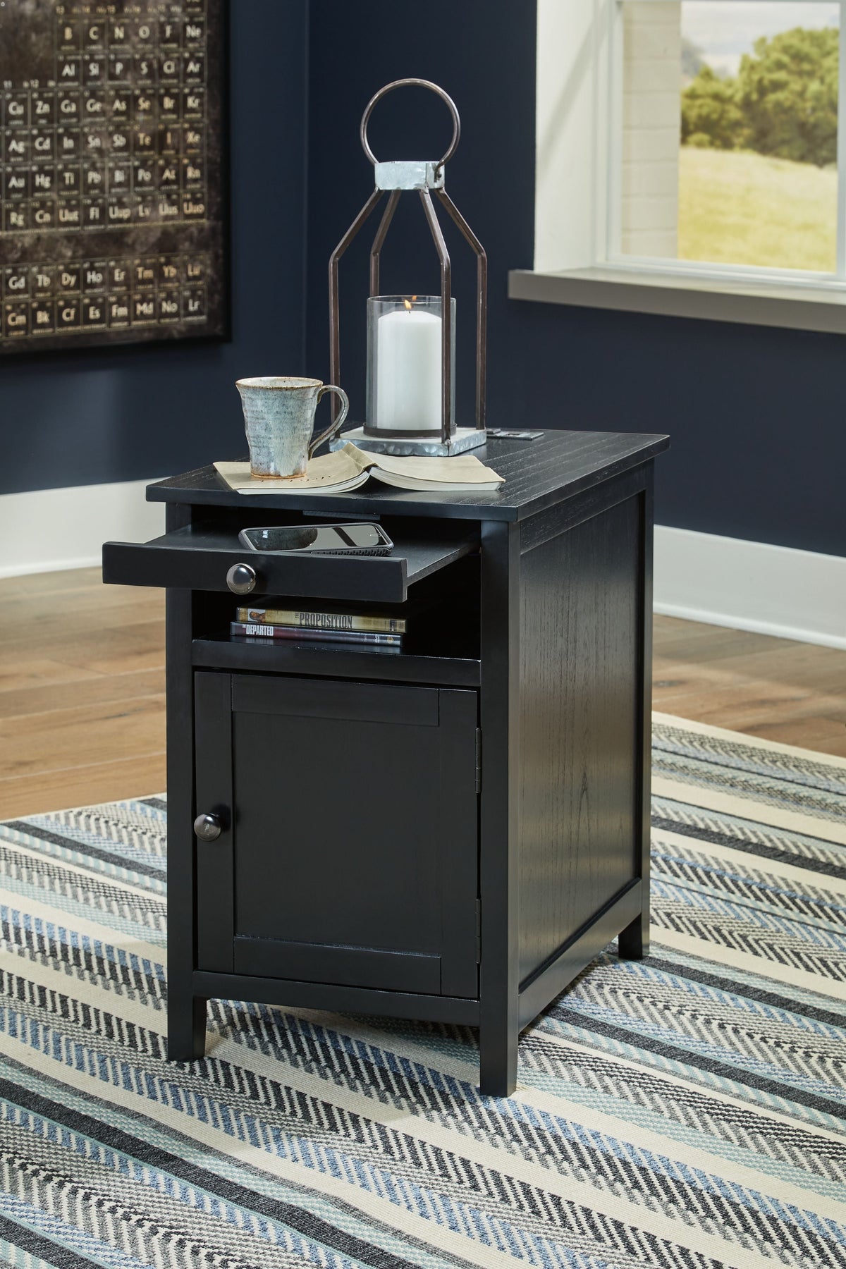 Chair side end table in dark gray wood with drawer and cabinet door, open lower shelf