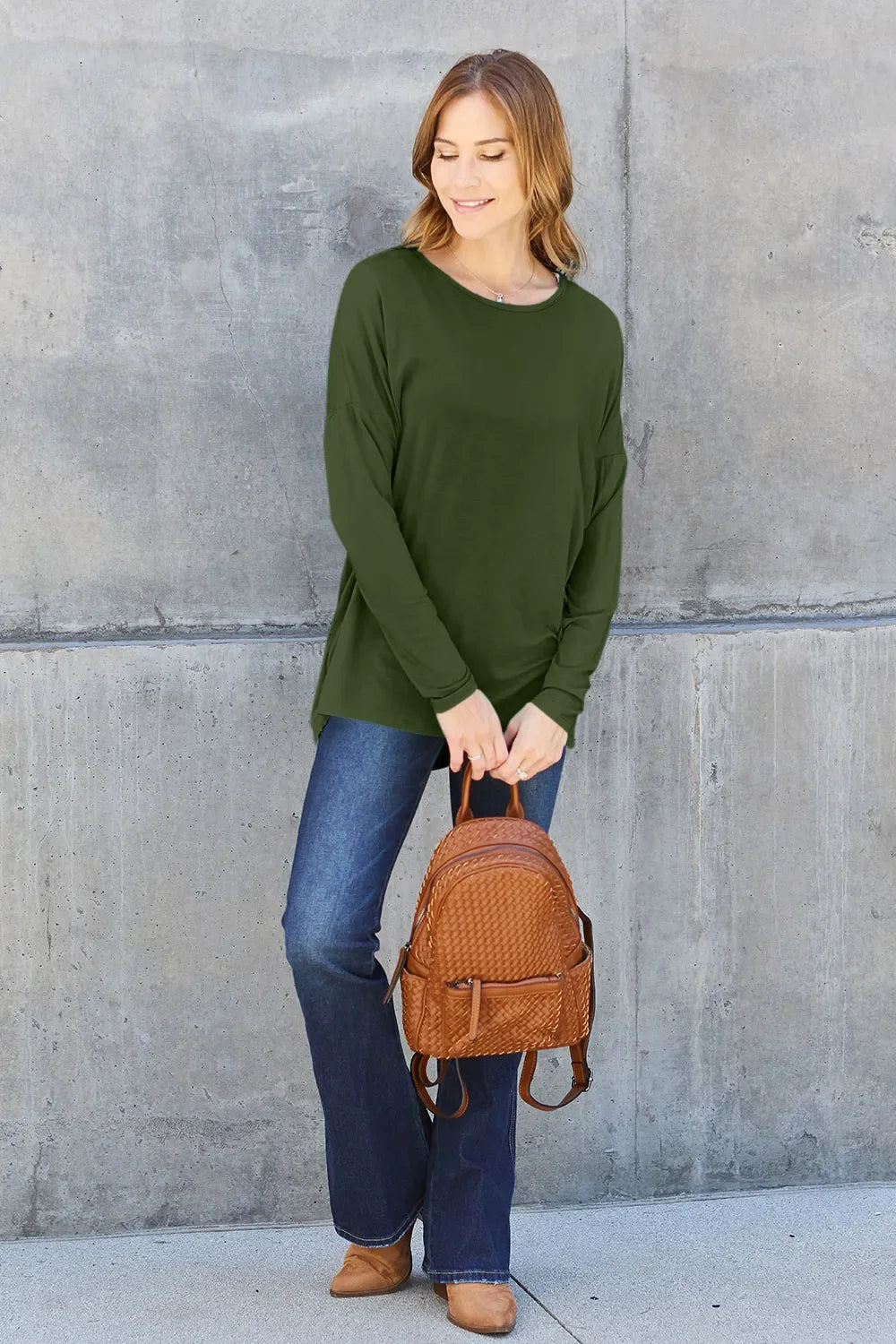 Army green relaxed long-sleeve tee, side view with crew neck and straight hem