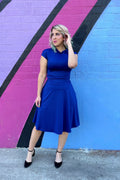 Royal blue fit-and-flare dress with bow collar, ruched waist, cap sleeves