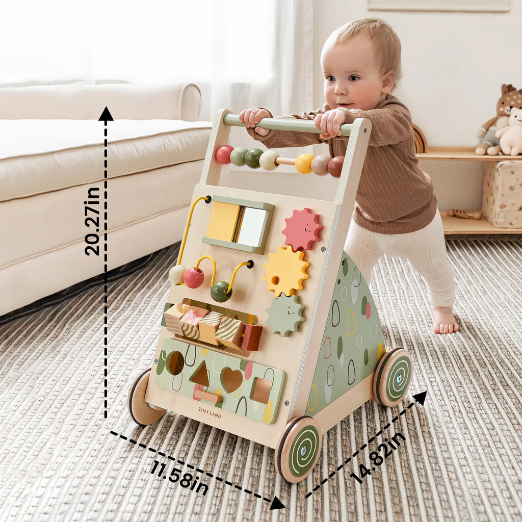 Toddler using wooden baby walker with bead roller, gear toys, and mirror panel on wheels