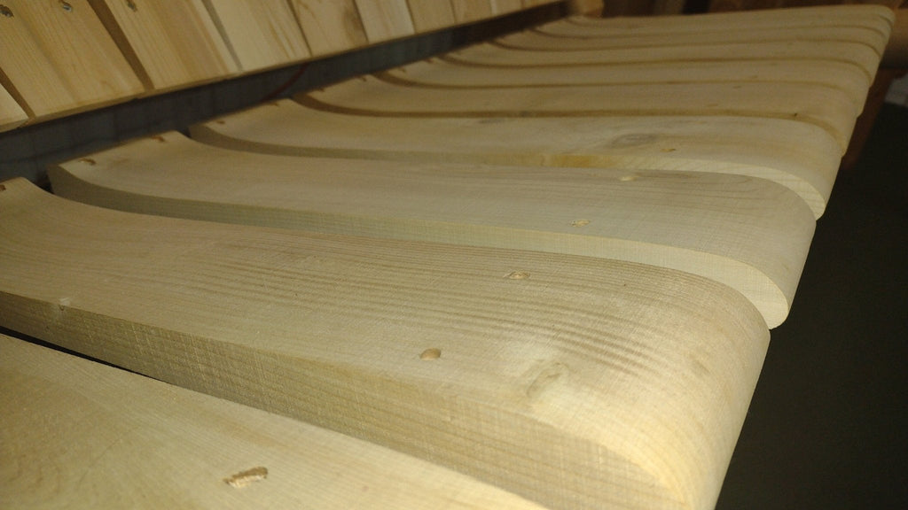 Wooden porch swing seat slats with natural light wood grain