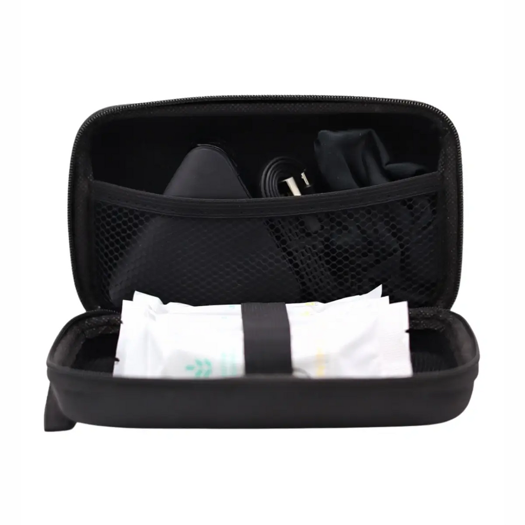 Open black travel case showing mesh pocket, cable, and tissue packets