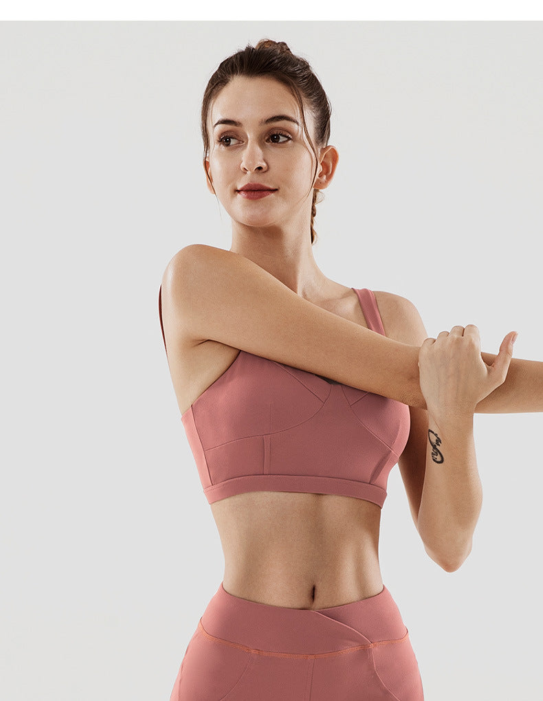 Rose pink sports bra and matching high-waist underwear set, front view.