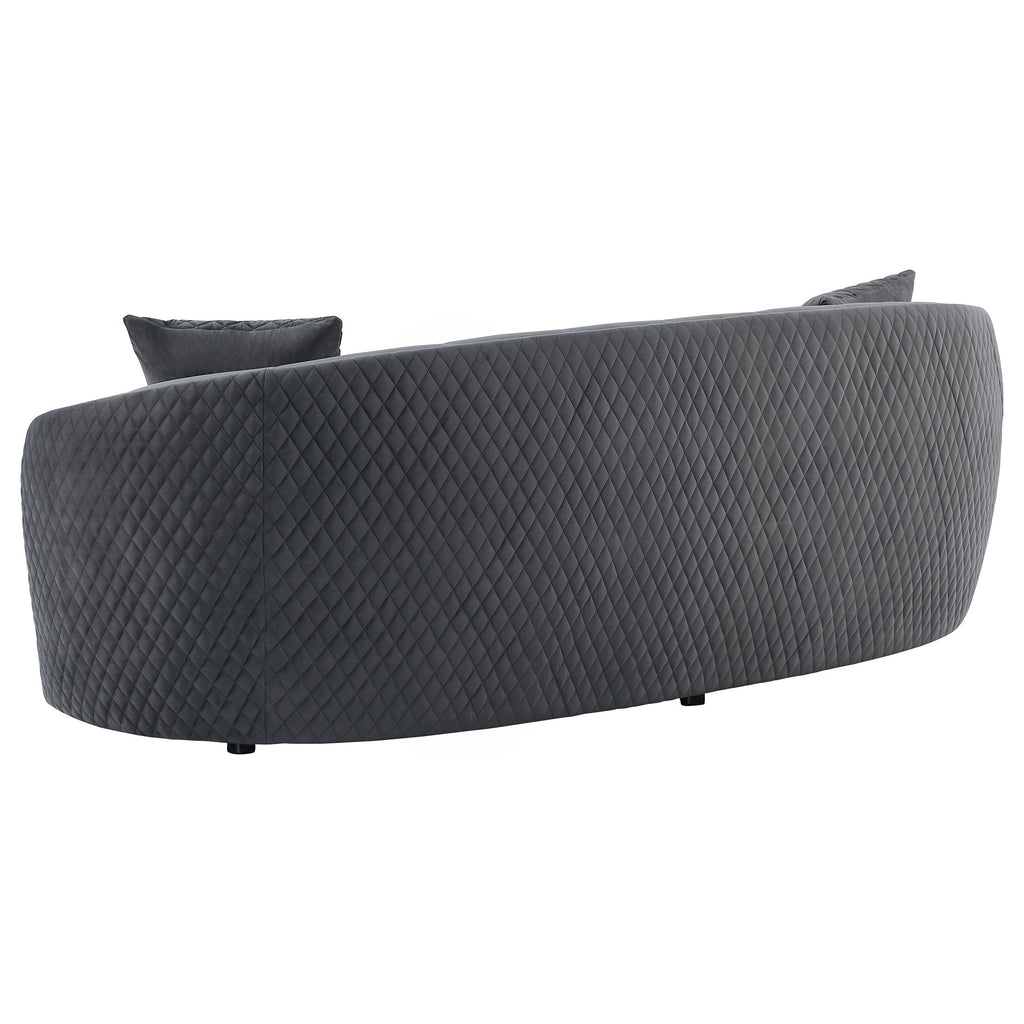 Dark grey velvet sofa with quilted side panels and two back cushions, gold trim piping