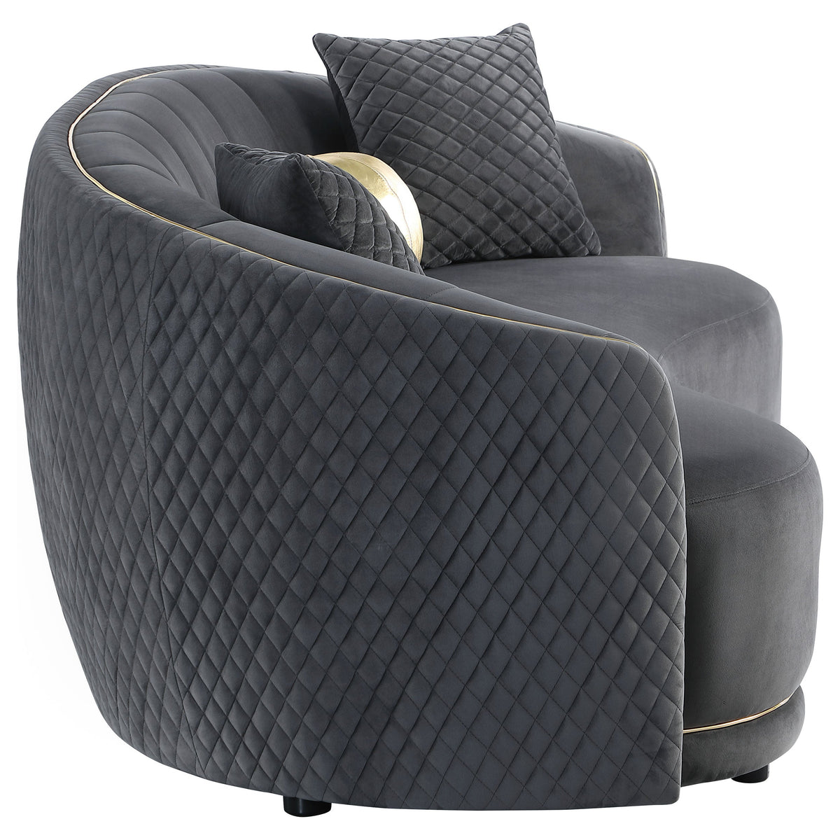 Dark grey velvet armchair-style sofa with quilted upholstery and gold edge piping