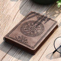 A6 leather mini notebook with embossed emblem on khaki-beige cover