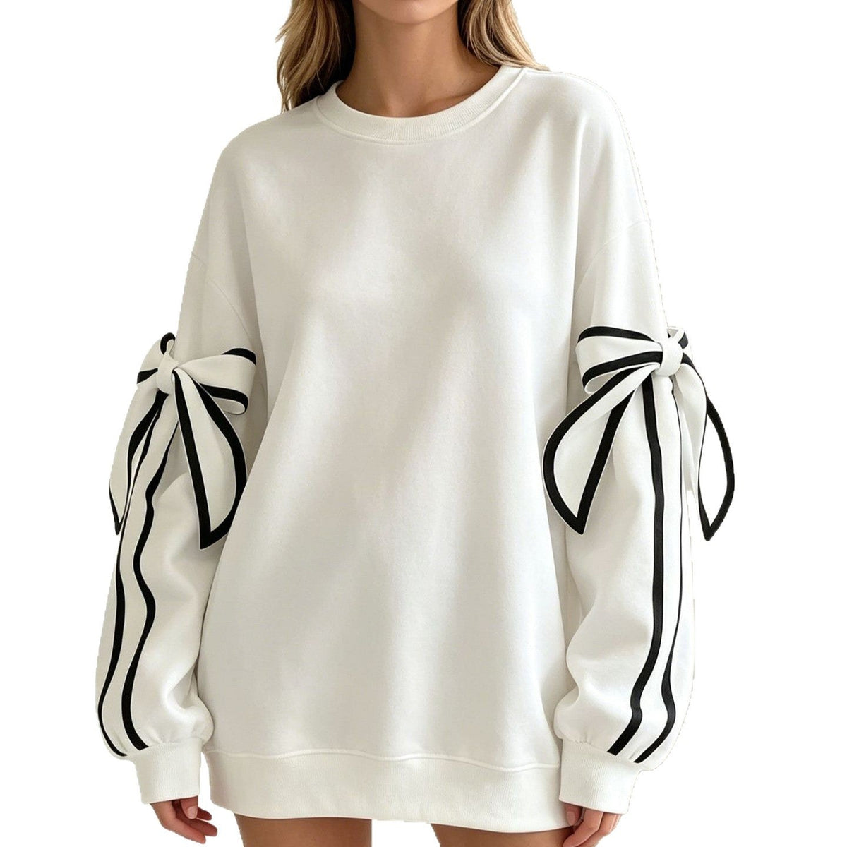 White crewneck long-sleeve sweater with black striped bow cuffs and relaxed fit.