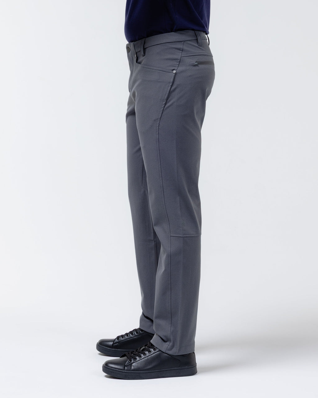 Charcoal chino pants side view with belt loops, stitched seams, and ankle opening