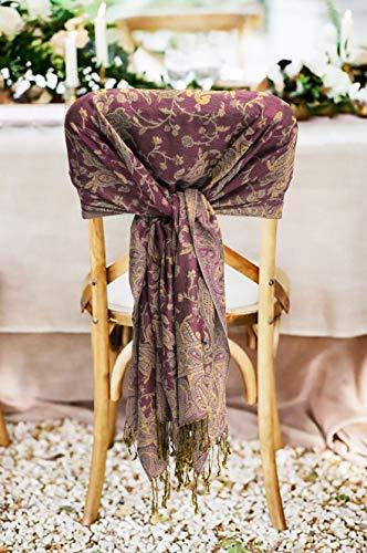 Plum paisley pashmina shawl wrap with gold fringe tassels, tied on chair back.