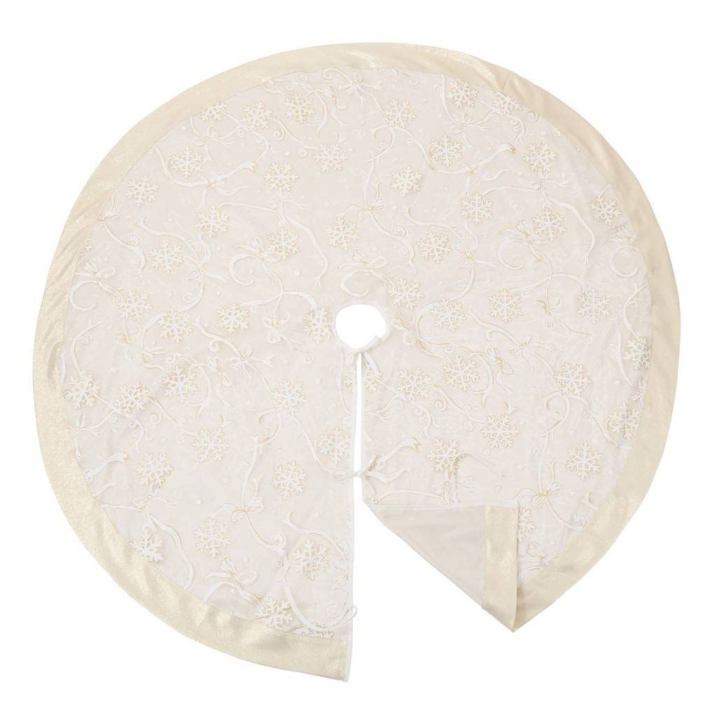 Cream 52 in tree skirt with white snowflake and ribbon pattern; V-shaped center seam and hole.